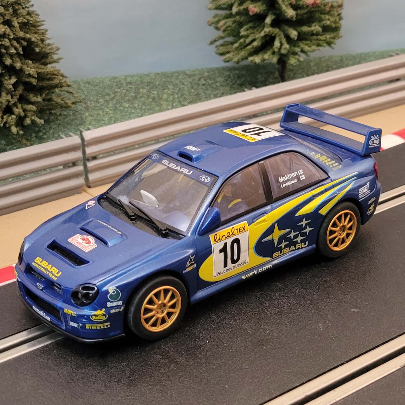 Scalextric 1:32 Car - C2412 Subaru Impreza WRC Makinen #10 *LIGHTS* #Q