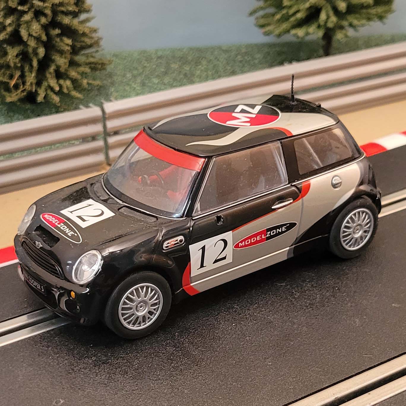 Scalextric 1:32 Car -  C2631 Black BMW Mini Cooper MODELZONE *LIGHTS* #MW